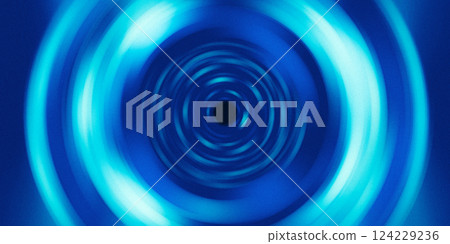 Spin blur effect in blue color with grainy texture on dark background Spin blur effect in blue color with grainy texture on dark background 124229236
