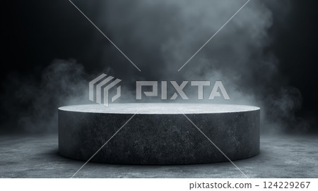 A platform of gray textured concrete with a haze in the darkness 124229267