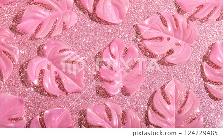 Pink monstera leaves and glitter background 124229485