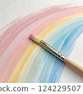 Paint brush with paint. 124229507