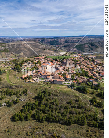 ancient roman town Medinaceli with old cozy streets and historic buildings aerial top view, old medieval european village drone view, Spain ancient roman town Medinaceli with old cozy streets and historic buildings aerial top view, old medieval european village drone view, Spain 124231041