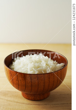 Rice served in a wooden bowl Rice served in a wooden bowl 124231873