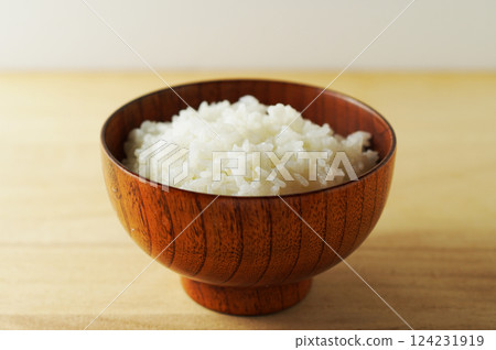 Rice served in a wooden bowl 124231919