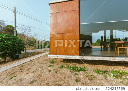 Modern cafe exterior with glass windows Modern cafe exterior with glass windows 124232569