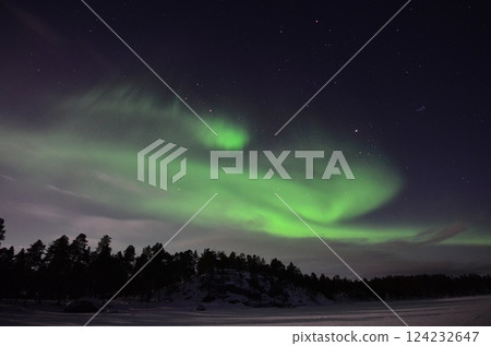 Inari, Finland, is located within the Arctic Circle and has a high chance of seeing the Northern Lights. 124232647