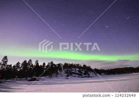 Inari, Finland, is located within the Arctic Circle and has a high chance of seeing the Northern Lights. 124232649