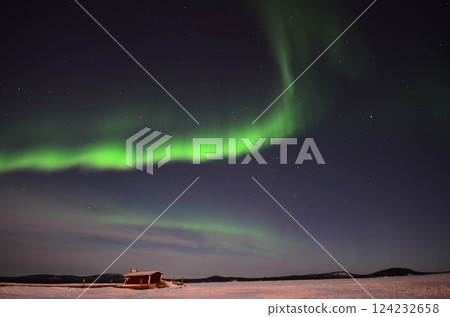 Inari, Finland, is located within the Arctic Circle and has a high chance of seeing the Northern Lights. 124232658