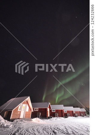 Inari, Finland, is located within the Arctic Circle and has a high chance of seeing the Northern Lights. 124232666