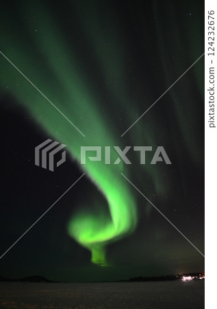 Inari, Finland, is located within the Arctic Circle and has a high chance of seeing the Northern Lights. 124232676