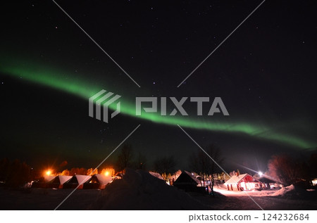 Inari, Finland, is located within the Arctic Circle and has a high chance of seeing the Northern Lights. 124232684