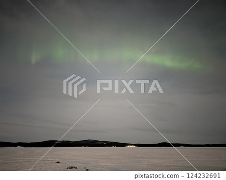 Inari, Finland, is located within the Arctic Circle and has a high chance of seeing the Northern Lights. 124232691