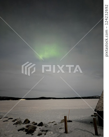 Inari, Finland, is located within the Arctic Circle and has a high chance of seeing the Northern Lights. 124232692