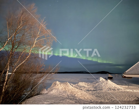 Inari, Finland, is located within the Arctic Circle and has a high chance of seeing the Northern Lights. 124232733