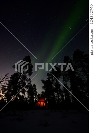 Inari, Finland, is located within the Arctic Circle and has a high chance of seeing the Northern Lights. 124232740