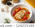 Grilled chicken breast with spaghetti tomato sauce in white plate 124233189
