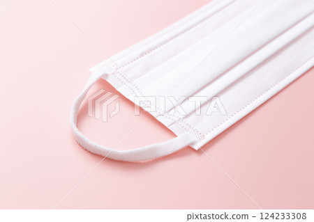 Pink background with mask Pink background with mask 124233308