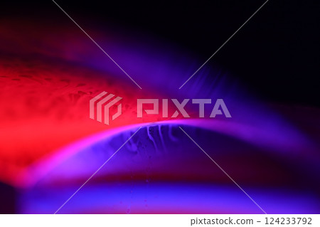 Red and purple fluid reflections on black background, liquid surface abstraction, colour edge, deep dark backgrounds, geometric water shapes, fluids movement, phenomenal physical features Red and purple fluid reflections on black background, liquid surface abstraction, colour edge, deep dark backgrounds, geometric water shapes, fluids movement, phenomenal physical features 124233792