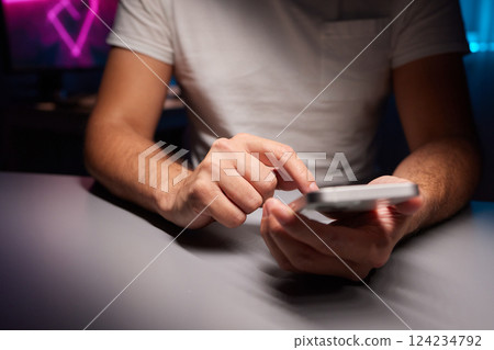 Successful of trader use phone and laptop trading stock exchange graph money 124234792