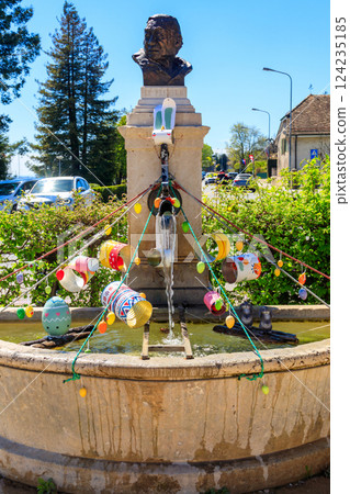 Festive decorations for Easter holiday on the fountain in Nyon, Switzerland 124235185