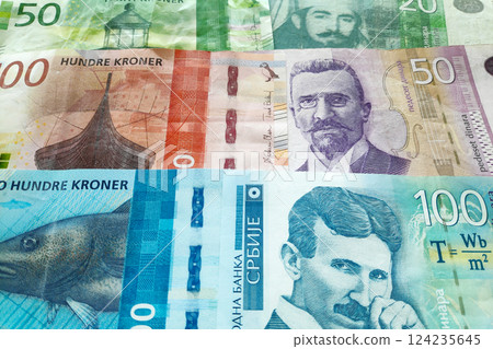 Stack of Norwegian krone and Serbian Dinar 124235645