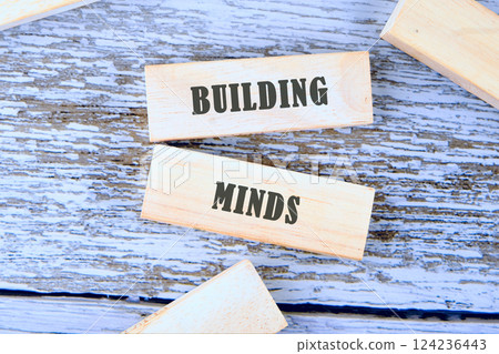 Text blocks display the phrase Building Minds, emphasizing the importance of education in the business and finance fields Text blocks display the phrase Building Minds, emphasizing the importance of education in the business and finance fields 124236443