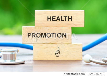 Blocks with medical tools highlight a focus on health promotion and improvement strategies Blocks with medical tools highlight a focus on health promotion and improvement strategies 124236719