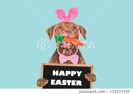 Happy Easter. Cute dog and congratulatory inscription Happy Easter. Cute dog and congratulatory inscription 124237297
