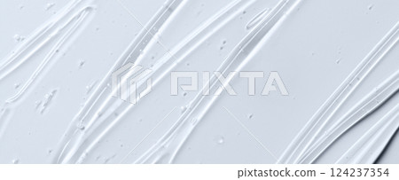 The texture of a cosmetic serum for the face with hyaluronic acid and collagen 124237354