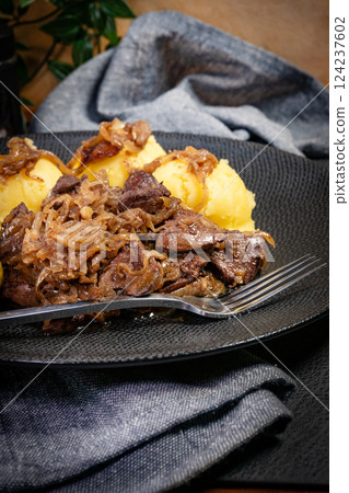 Chicken liver stewed with onion. Chicken liver stewed with onion. 124237602