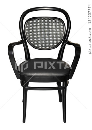Classic black chair with cane detailing adds elegance to any living space. Isolated on white background. Classic black chair with cane detailing adds elegance to any living space. Isolated on white background. 124237774