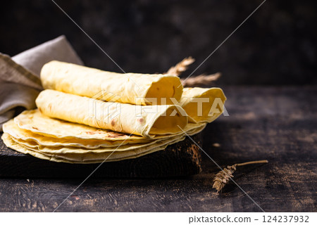 Lavash flat bread on green background 124237932