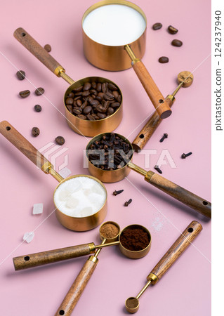 Coffee Brewing Ingredients in Measuring Cups. Coffee Brewing Ingredients in Measuring Cups. 124237940