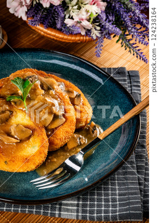 Potato cutlets with mushroom sauce. Potato cutlets with mushroom sauce. 124238164