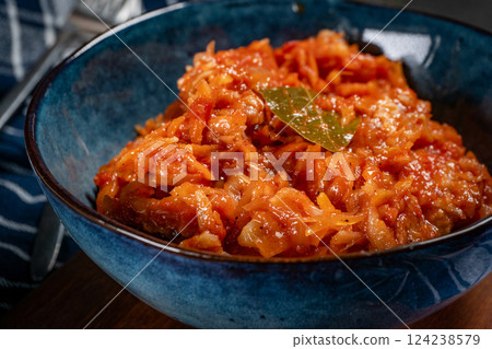 Fish stew with vegetables. 124238579