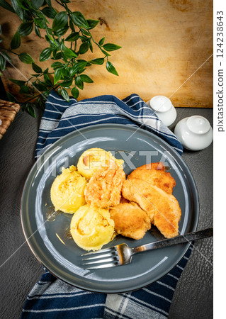Breaded chicken breast fillet 124238643