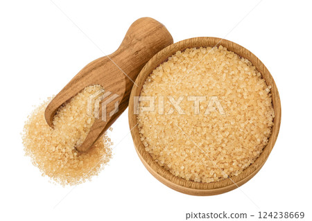 The brown sugar in wooden bowl and scoop isolated on white background. Top view. Flat lay 124238669
