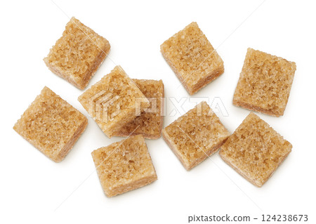 brown sugar cubes isolated on white background. Top view, flat lay brown sugar cubes isolated on white background. Top view, flat lay 124238673