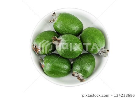 Feijoa fruit in a ceramic bowl isolated on white background 124238696