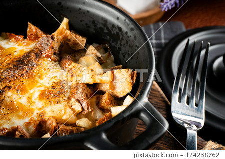 Ramekin with delicious casserole. Ramekin with delicious casserole. 124238762