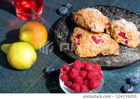 Pear and raspberry scones. Fresh pastries. 124239203