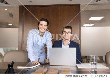 Portrait of two enthusiastic goal-oriented teammates posing for camera 124239641