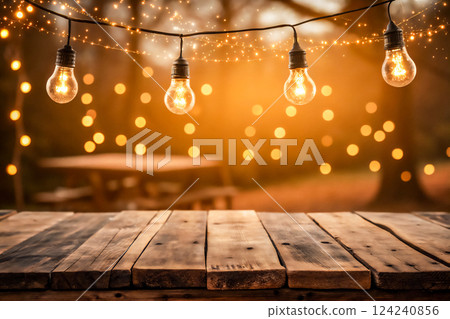 Warm wooden tables and gentle lighting Warm wooden tables and gentle lighting 124240856