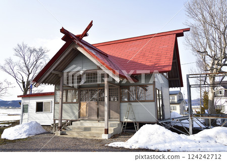 Photographing the grounds of Tsuruno Inari Shrine in Nanae Town, Hokkaido in early spring 124242712