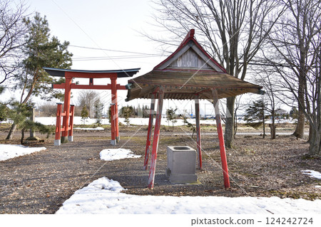 Photographing the grounds of Tsuruno Inari Shrine in Nanae Town, Hokkaido in early spring 124242724