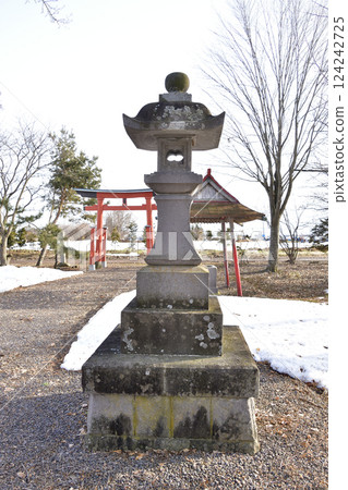 Photographing the grounds of Tsuruno Inari Shrine in Nanae Town, Hokkaido in early spring 124242725