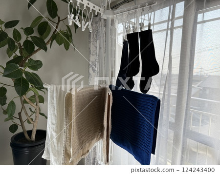 Drying laundry indoors Drying laundry indoors 124243400