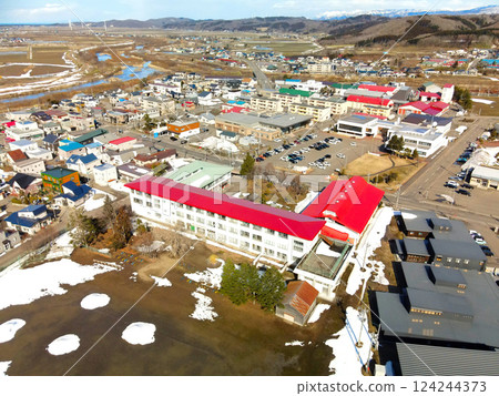 Aerial view of Atsutabe Town Municipal Atsutabe Elementary School in Atsutabe Town, Hokkaido in early spring Aerial view of Atsutabe Town Municipal Atsutabe Elementary School in Atsutabe Town, Hokkaido in early spring 124244373
