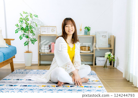 Young woman living alone in an apartment 124244793