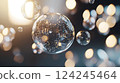 Transparent soap bubbles with a glossy surface float through the air, reflecting surrounding light.	 124245464