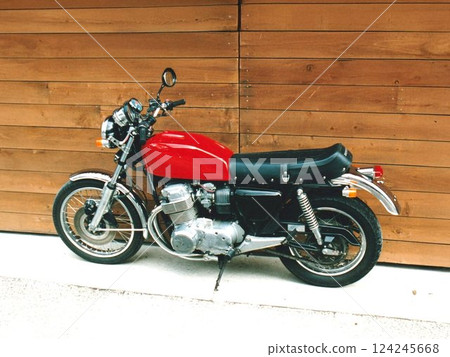 Red bike in the garage 124245668